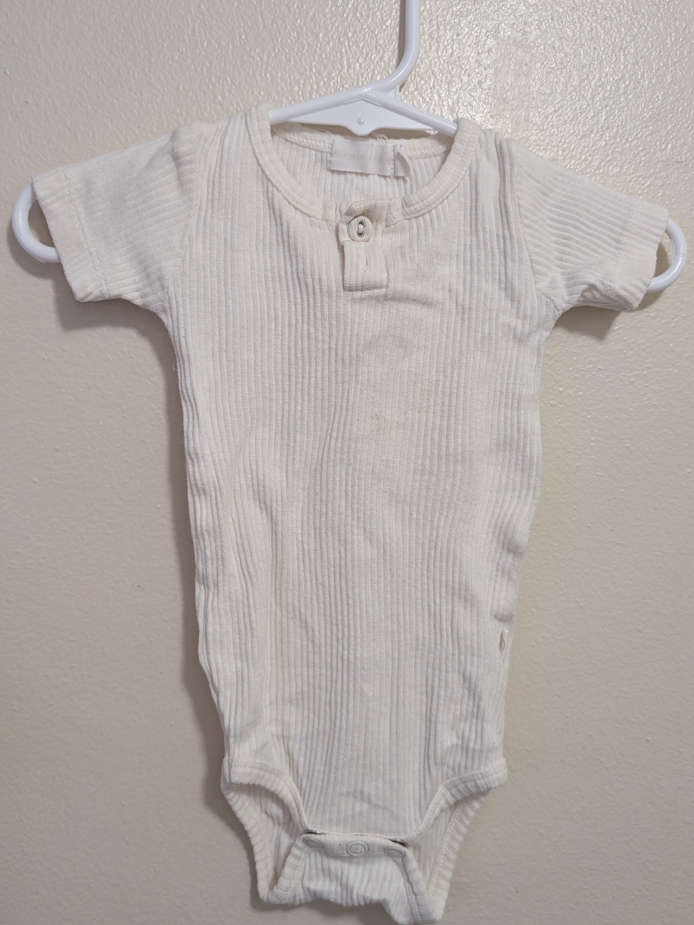 Jamie Kay Cream Ribbed Short-Sleeve One-Piece Bodysuit